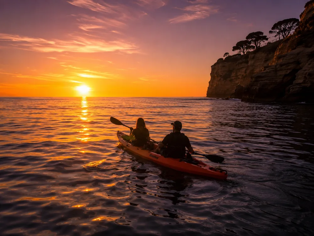 Tandem kayak at golden hour off Point La Jolla
